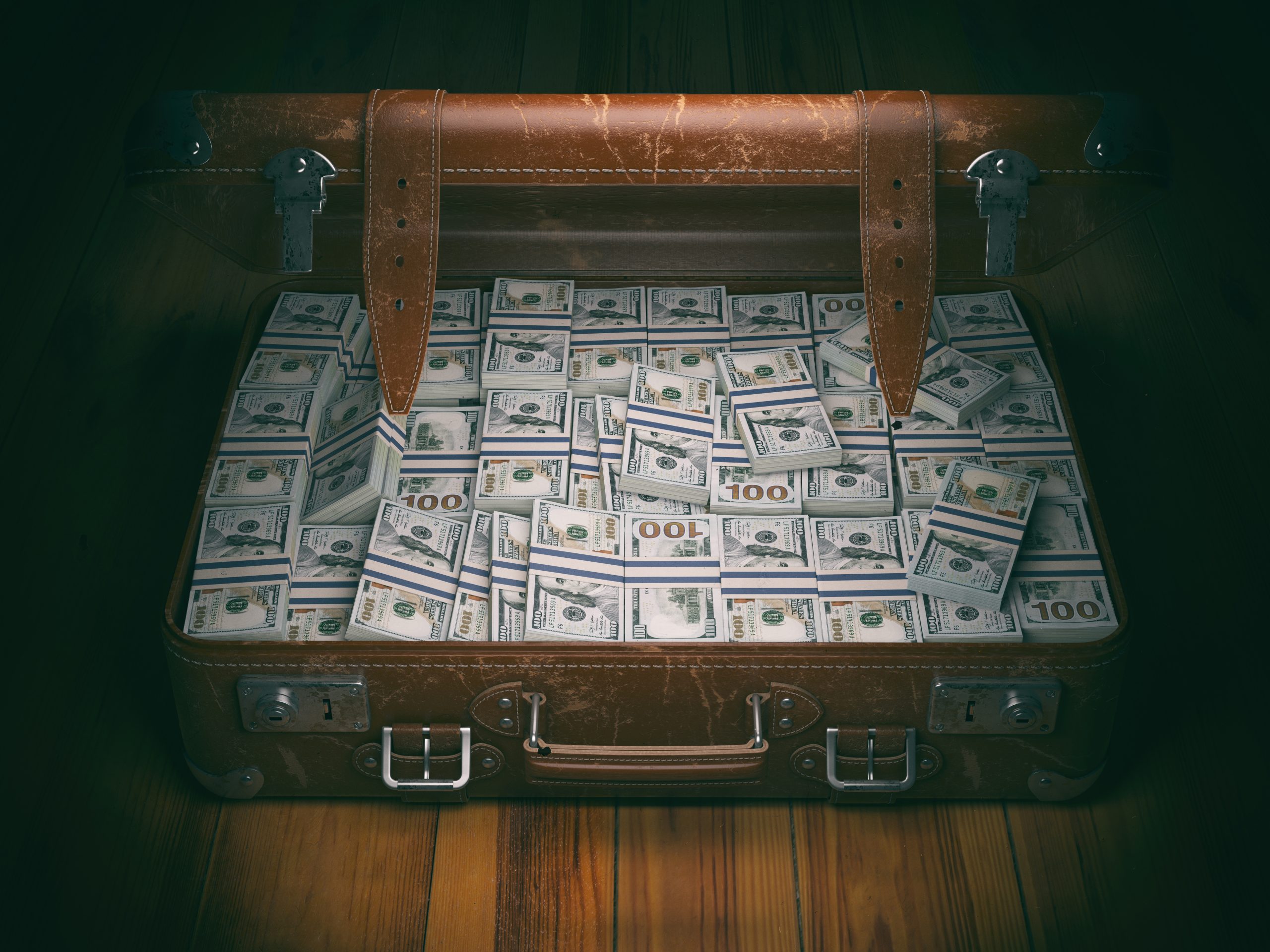 Vintage suitcase full of money.