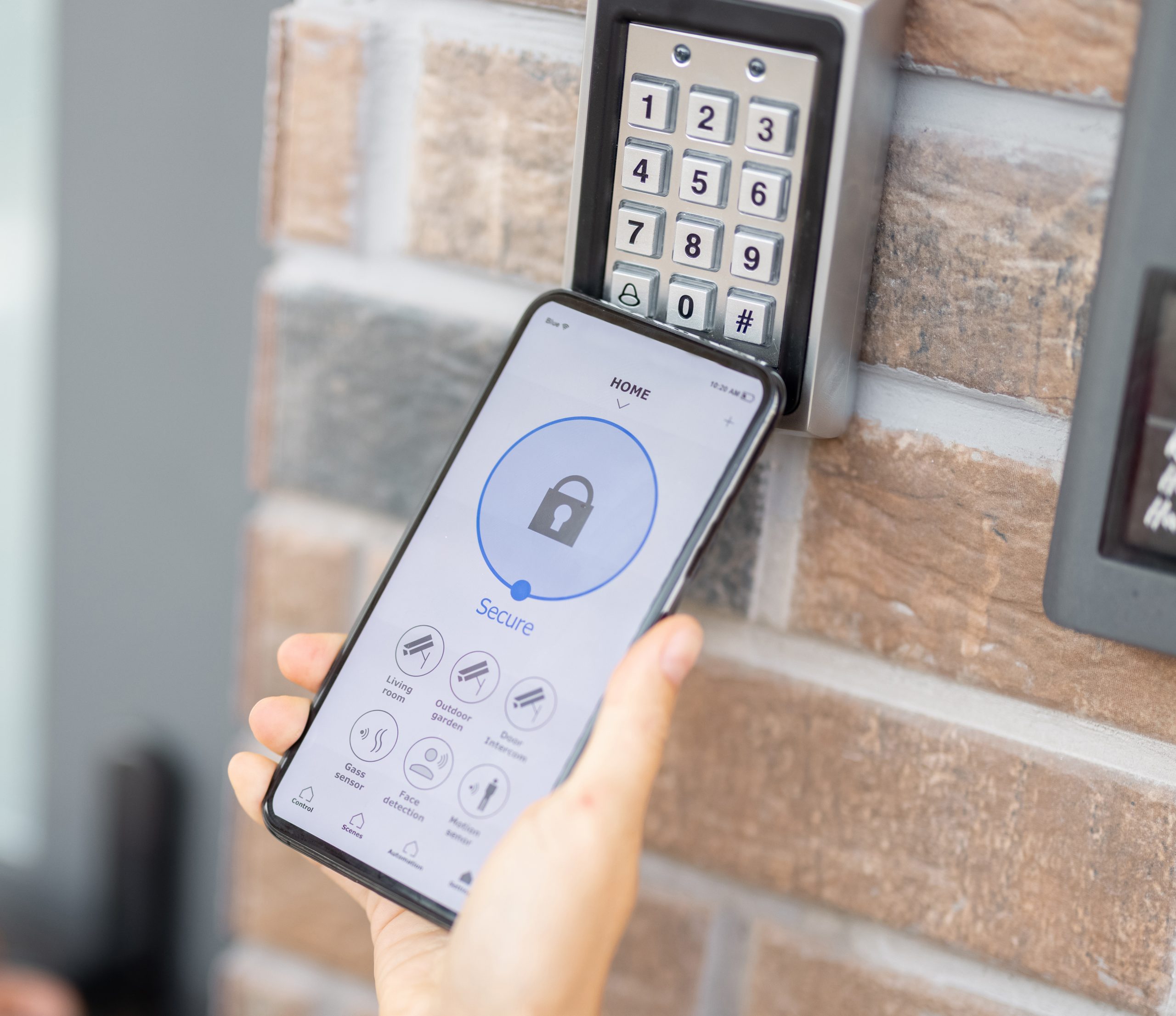 Opening door with a smart phone and keyboard on the wall