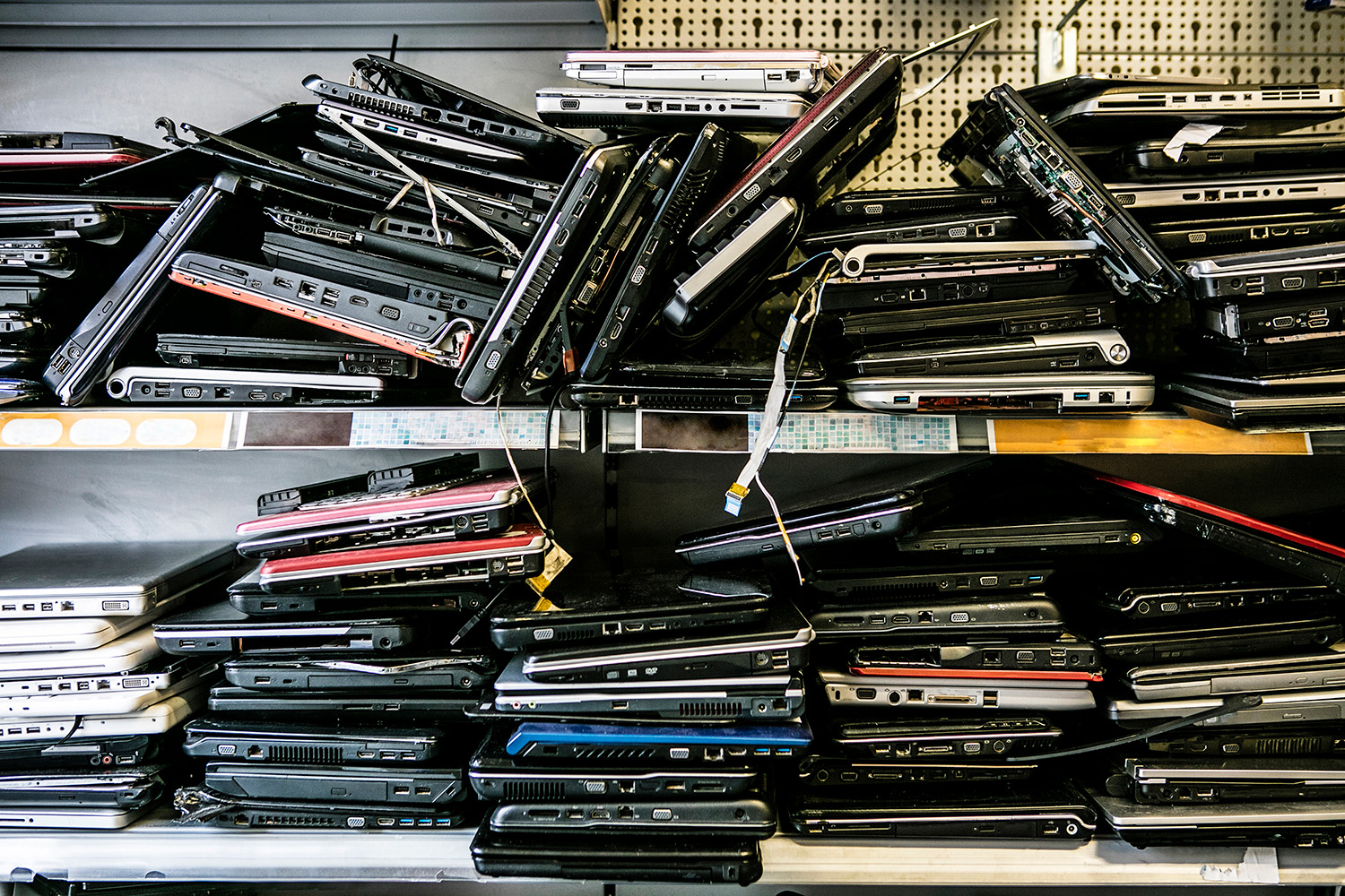 What to do with pile of old laptops on shelf