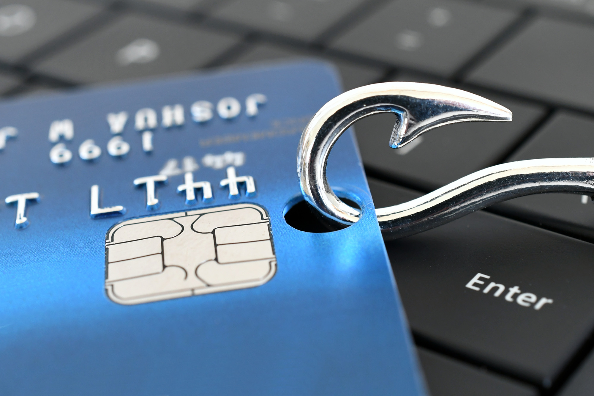 credit card on a hook for phishing scam